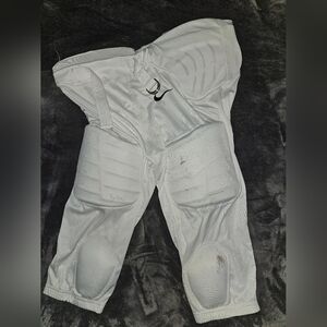 Nike dri-fit padded football pants Size XL.